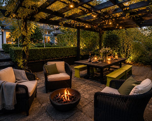 Outdoor firepit and pergola dining area at Treghan Lodge during a winter evening in Kerikeri, Bay of Islands Outdoor firepit and pergola dining area at Treghan Lodge during a winter evening in Kerikeri, Bay of Islands