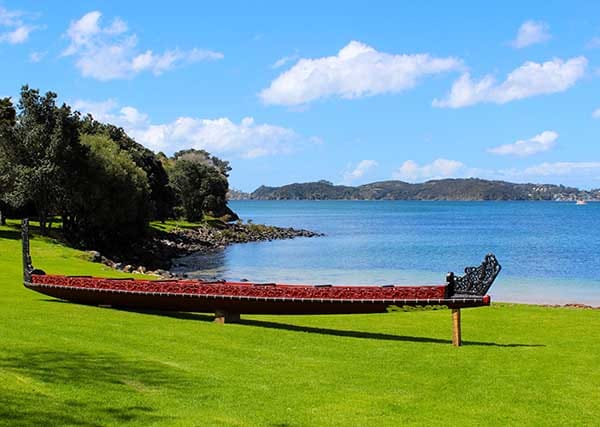 Traditional waka at the Waitangi Treaty Grounds overlooking the Bay of Islands Traditional waka at the Waitangi Treaty Grounds overlooking the Bay of Islands