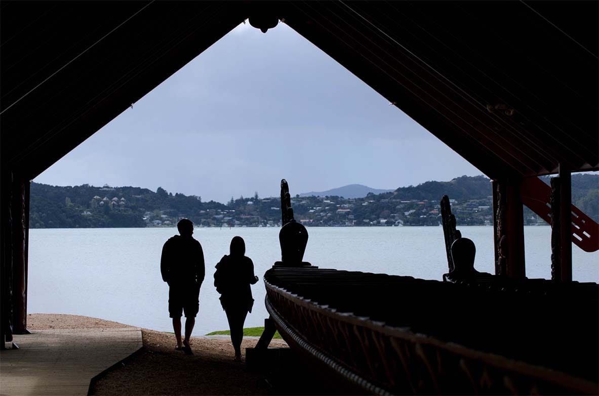 Visitors at Waitangi Treaty Grounds overlooking the Bay of Islands, one of New Zealand's most significant cultural and historic sites. Visitors at Waitangi Treaty Grounds overlooking the Bay of Islands, one of New Zealand's most significant cultural and historic sites.