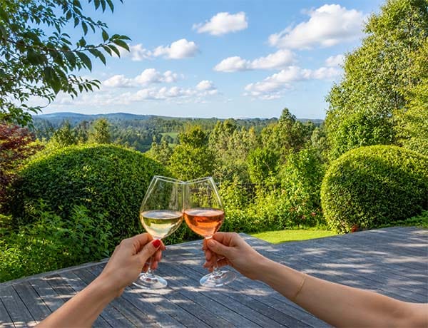 Guests enjoying the garden setting at Treghan, a luxury guesthouse retreat in Kerikeri, Bay of Islands