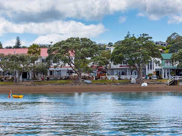 Historic Russell waterfront viewed across the bay in the Bay of Islands, Northland, New Zealand. Historic Russell waterfront viewed across the bay in the Bay of Islands, Northland, New Zealand.