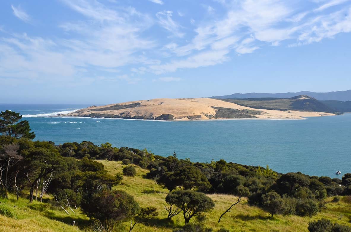 View across Hokianga Harbour to the famous sand dunes on the west coast of Northland. View across Hokianga Harbour to the famous sand dunes on the west coast of Northland.