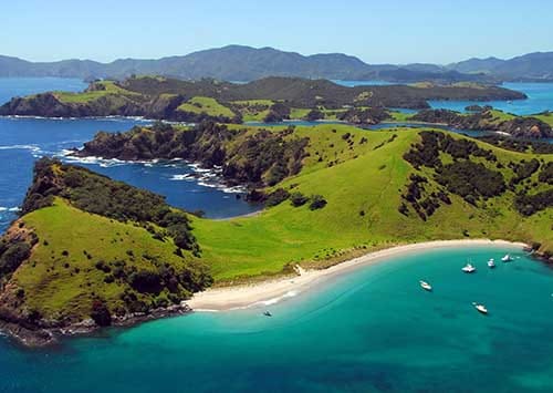 Bay of Islands coastline and islands in spring, Northland New Zealand Bay of Islands coastline and islands in spring, Northland New Zealand